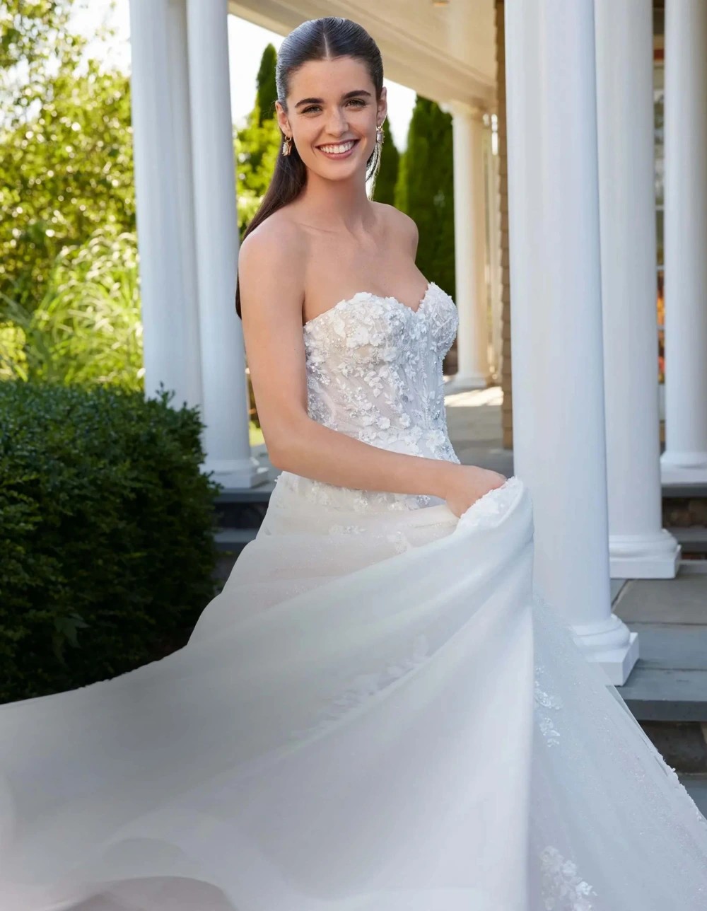 Model wearing a Downtown Gowns Bridal Collection Gown